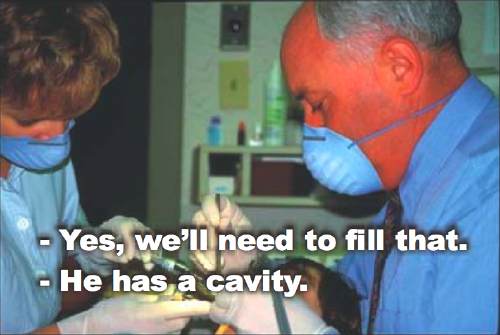 Screenshot shows dentist and hygienist and captions: - Yes, we’ll need to fill that. - He has a cavity.