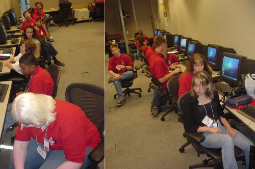 Kids in matching red polo shirts sit at computers in Æron chairs