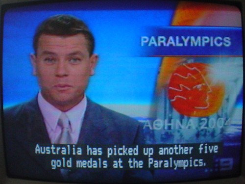 Two lines of white captions on a news program