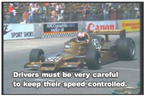 Screenshot shows racecar and caption reading: Drivers must be very careful to keep their speed controlled.
