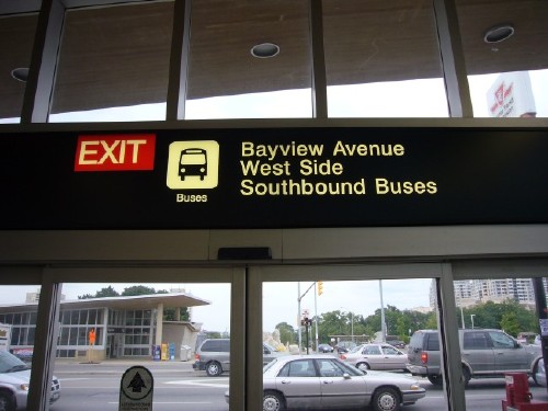 EXIT sign over door reads Bayview Avenue West Side Southbound Buses