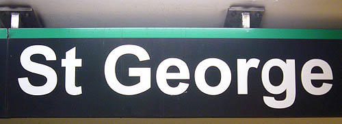 Sign with green band across the top reads St George in Arial