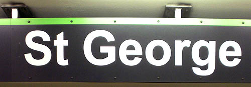 Sign with green band across the top reads St George in Arial, with map legend at left