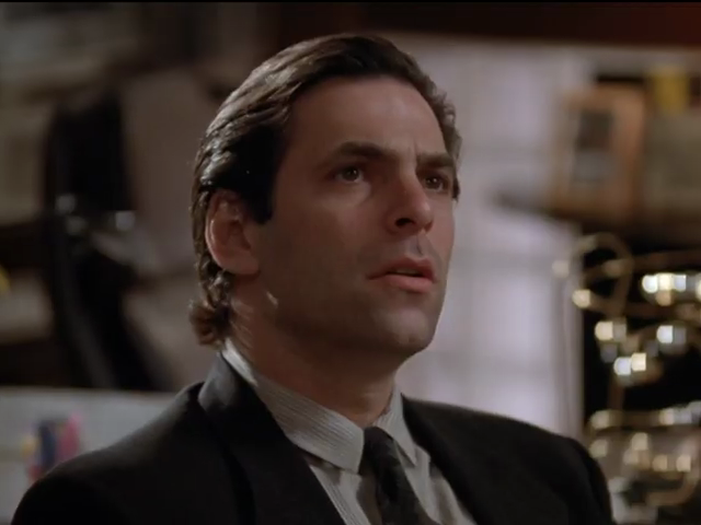 Michael with slicked-back hair