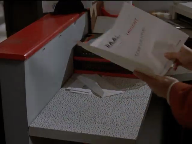 Desk surface in mezzotint with bright orange wall top