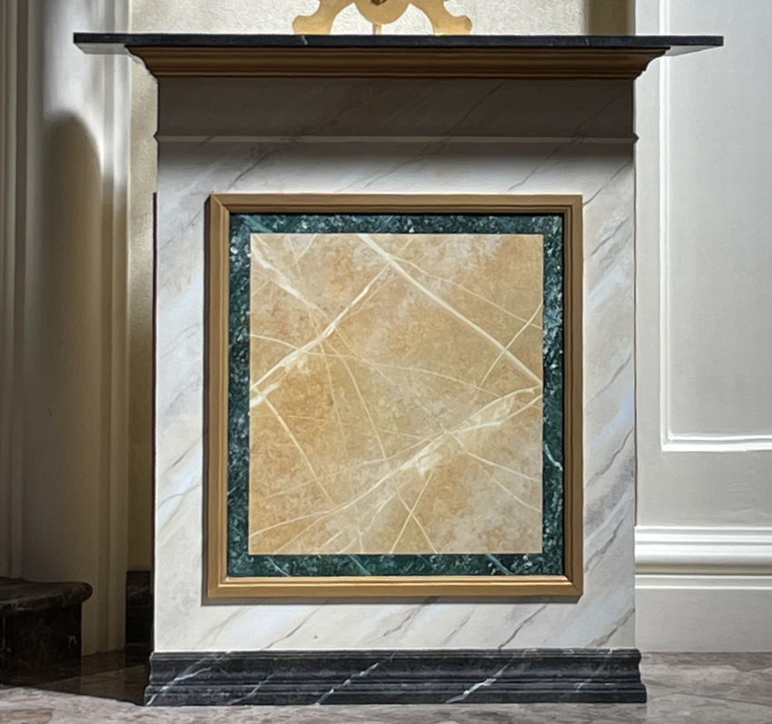 Table with square outline of inset green marble